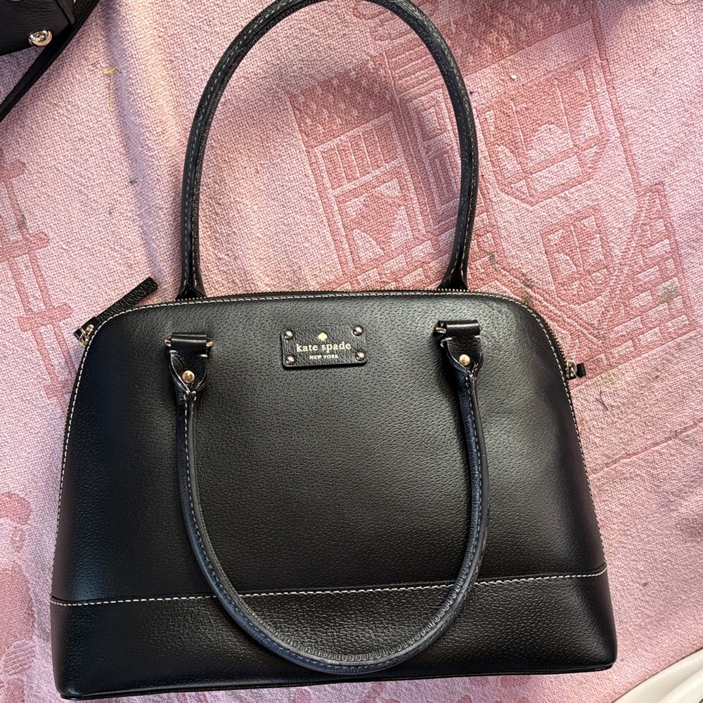 Especial yes today .Kate Spade Black Leather Handbages
